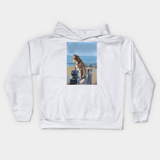 A  ginger cat looking at the ocean Kids Hoodie